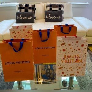 Authentic LV Paper Shopping Bag

Measurements 9.75 x 14” x 4.5”